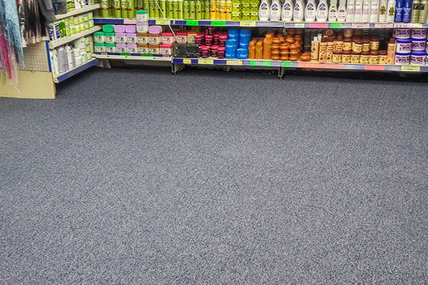 Versatile, hard wearing and easy cleaning, carpet tile fit-out in a South Bedfordshire convenience store.